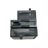 Black plastic component on a white background