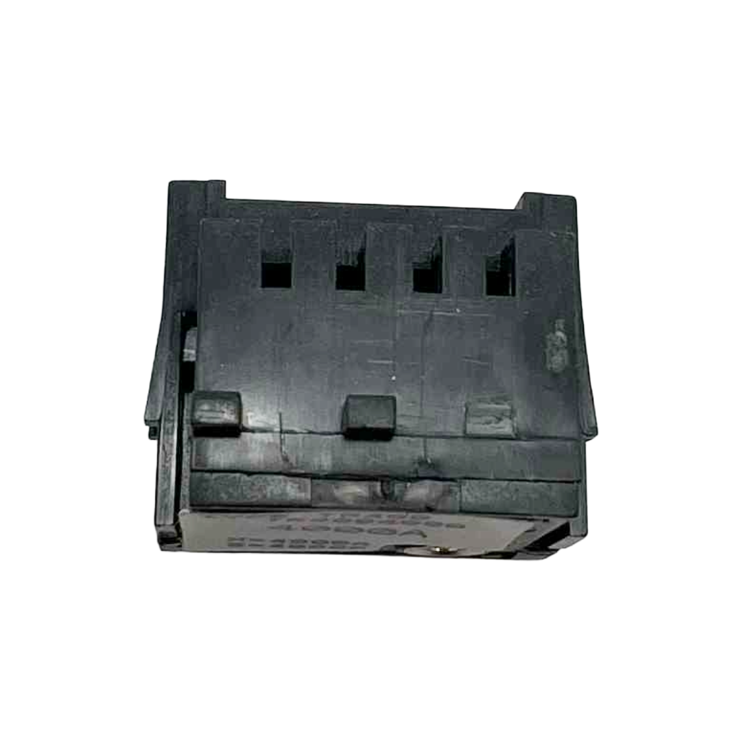 Black plastic component on a white background