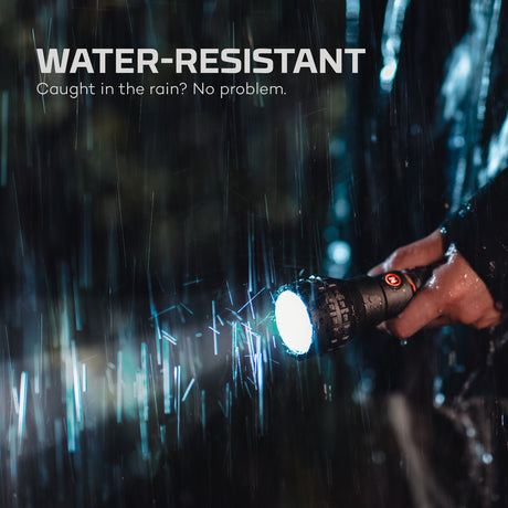 Person holding a flashlight in the rain with 'WATER-RESISTANT' text above.